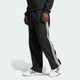 Мужские спортивные брюки Adicolor Baggy Fit Firebird adidas IZ4801 (XL) черный (4067894639767) - изображение 1
