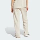 Женские спортивные брюки Essentials Small Logo Feel Cozy Open-Hem adidas JC5922 (2XS) бежевый (4067891969232) - изображение 2