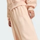 Женские спортивные брюки FUTURE ICONS THREE STRIPES OPEN HEM adidas KB9593 (XL) розовый (4068815213172) - изображение 5