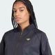 Жіноча олімпійка adidas KD3778 (XS) чорний (4068805011825) - зображення 4