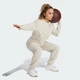Женские джоггеры Designed For Training Warm-Up adidas JW3398 (L) бежевый (4068809032666) - изображение 3