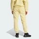 Жіночі спортивні штани adidas Z.N.E. adidas JJ4770 (S) жовтий (4067905021826) - зображення 2