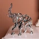 Статуэтка слон Elephant 25×10×25 см металлическая серебристая ажурная с поднятым хоботом для дома гостиной декор Yiwu - изображение 1