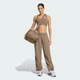 Жіночі спортивні штани Workout Essentials Woven adidas KT1259 (XS) бежевий (4069993476601) - зображення 4