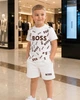 Костюм для хлопчика BOSS (футболка+шорти) 110-116 см білий - зображення 2