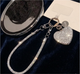 Брелок Swarovski Bow Silver для украшения телефона стильный аксессуар с кристаллами для подарка и личного использования - изображение 1