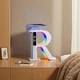 Беспроводная колонка XM-X69 в форме буквы «R» с LED-подсветкой и функцией беспроводной зарядки - изображение 1
