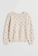 Дитячий светр для дівчинки H&M 134-140 см Бежевий (00682) - изображение 1