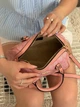 Женская сумка Coach Mini Rowan Crossbody In Signature розовая - изображение 7