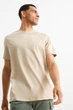 Футболка с принтом C&A 2219188c28 S бежевая (100011182) - изображение 1