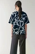 Футболка жіноча COS rounded neck printed top 0884170001 L Синій - изображение 4