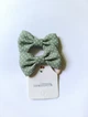 Набор текстильных резинок-бантиков для волос зеленый горошек (2 шт) - изображение 2