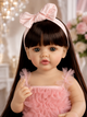 Реалістична лялька Reborn Baby Doll Victoria 55 см — вінілова дівчинка з довгим темним волоссям та аксесуарами, можна купати (RB086) - зображення 3