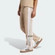 Жіночі спортивні штани Adibreak adidas IY2130 (L) бежевий (4067893245228) - зображення 1