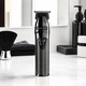 Триммер для барберов и парикмахеров BaByliss PRO Skeleton FX Gunsteel профессиональный для бороды, окантовки и фейда, бесщеточный Ferrari DC мотор, T-образный DLC нож 40 мм, Zero Gap, Li-Ion аккумулятор, EDM Technology, 7200 об/мин (EZ96XF) - изображение 1