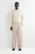 Штани чоловічі COS pleated relaxed-fit wide-leg trousers 1310975002 Eur 46 Бежевий - зображення 1