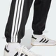 Женские джоггеры Essentials 3-Stripes Fleece Loose-Fit adidas JE1276 (S) черный (4067902923222) - изображение 5