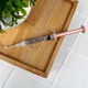 Отбеливающий гель Ultradent Opalescence PF 10% со вкусом дыни, 1 шприц (1,2 мл) — для домашнего отбеливания зубов - изображение 1