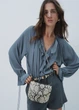 Блуза з оборками H&M 1247399002c34 L синя (100014074) - зображення 1