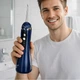 Ирригатор для полости рта 200 мл портативный аккумуляторный с 4 насадками Oral Irrigator, беспроводной с 3 режимами работы для ухода за зубами, деснами и брекетами Синий, AND-1-37-Blue - изображение 1