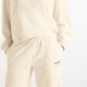 Женские бежевые спортивные брюки New Balance Trackside French Terry 38 (M) (WB62412FLIT) - изображение 4