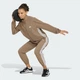 Куртка Train Essentials 3-Stripes Woven Warm-Up Jack adidas KV7095 (L) бежевий (4069993492052) - зображення 3