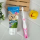 Набір Brush-Baby для перших зубів (паста Зайчик 50 мл + 1 щітка First Brush, рожева) - зображення 1
