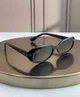 Солнцезащитные очки Ray-Ban RB4441D черные глянцевые, голубая линза, овальные, женские, унисекс, - изображение 1