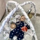 Развивающий коврик Nukido для младенцев с дугами 7 игрушками и подушкой для животика 970х780 мм с теплоизоляцией для гармоничного развития ребенка от рождения для безопасных игр на полу - изображение 3