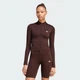Женская олимпийка ESSENTIALS SEAMLESS TRACK adidas IA4527 (L) коричневый (4069999306476) - изображение 1