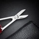 Ніж багатофункціональний ZWILLING з кусачками, ножицями та викруткою, винно-червоний - зображення 6