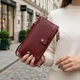 Стильний та яскравий жіночий гаманець-клатч ST Leather 19433 бордовий - зображення 2