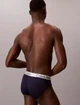 Набор трусов слипов мужских Calvin Klein NP2744O-OQI(Blue Bell Multi) XL 4 шт Мульти (198629056512) - изображение 3