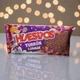 Молочный шоколад Huesitos Turrón Combix с хрустящим печеньем и какао 200 г - изображение 1