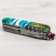 Нож Victorinox Huntsman Zodiac Змея Pink/Turquoise (1049-Vx13713.3_Z4290pk) - изображение 11