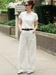 Поло женское Uniqlo 775035039 L Молочное (1161555808) - изображение 2