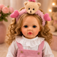 Реалістична лялька реборн Reborn Baby Doll Liana 55 см – дівчинка з кучерявим світлим волоссям та аксесуарами, можна купати (RB099) - зображення 7