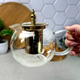 Стеклянный чайник-кофейник для плиты 950 мл Kandy GK-5801 с золотистыми элементами и удобным заварочным фильтром Прозрачный - изображение 4