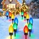 Сонячні різдвяні садові ліхтарі Joyoldelf 12 шт LED, гірлянда на кілках, декор для саду та доріжки - зображення 1