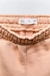 Спортивні штани джогери для дівчинки Zara бежевий 134 бавовняний трикотаж на флісі - зображення 2