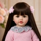 Реалістична лялька Reborn Baby Doll Seline 55 см — вінілова дівчинка з довгим темним волоссям та аксесуарами, можна купати (RB090) - зображення 4