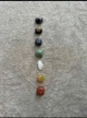 Набор натуральных камне 7 чакр в чёрном мешочке,камни для медитации и духовных практик - изображение 3