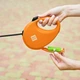 Поводок-рулетка для собак WAUDOG R-leash с контейнером для пакетов, светоотражающая лента, L, до 40 кг, 5 м, оранжевый - изображение 3