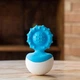 Прорезыватель-неваляшка Fat Brain Toys пищевой силикон 6х6х12 см голубой - изображение 5