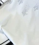 Блузка женская трикотажная стрейчевая со стразами и камнями короткий рукав Белая S-M - изображение 9