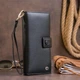 Жіночий гаманець ST Leather з натуральної шкіри чорний вертикальний для карт на хлястику з кнопкою 19х9х1 7 см 56542 - зображення 7