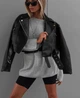 Жіноча куртка-косуха укорочена An501 чорного кольору 90253 - XL - изображение 2
