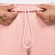 Брюки чоловічі Nike Solo Swoosh Men's Fleece Pants L Персиковий CW5460-697 - зображення 3