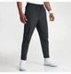 Брюки чоловічі Nike Dri-Fit Unlimited Tapered Leg 2XL Чорний FB7548-010 - зображення 4