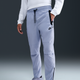 Брюки чоловічі Nike Tech Woven Blue M Синій HM8241-057 - зображення 1